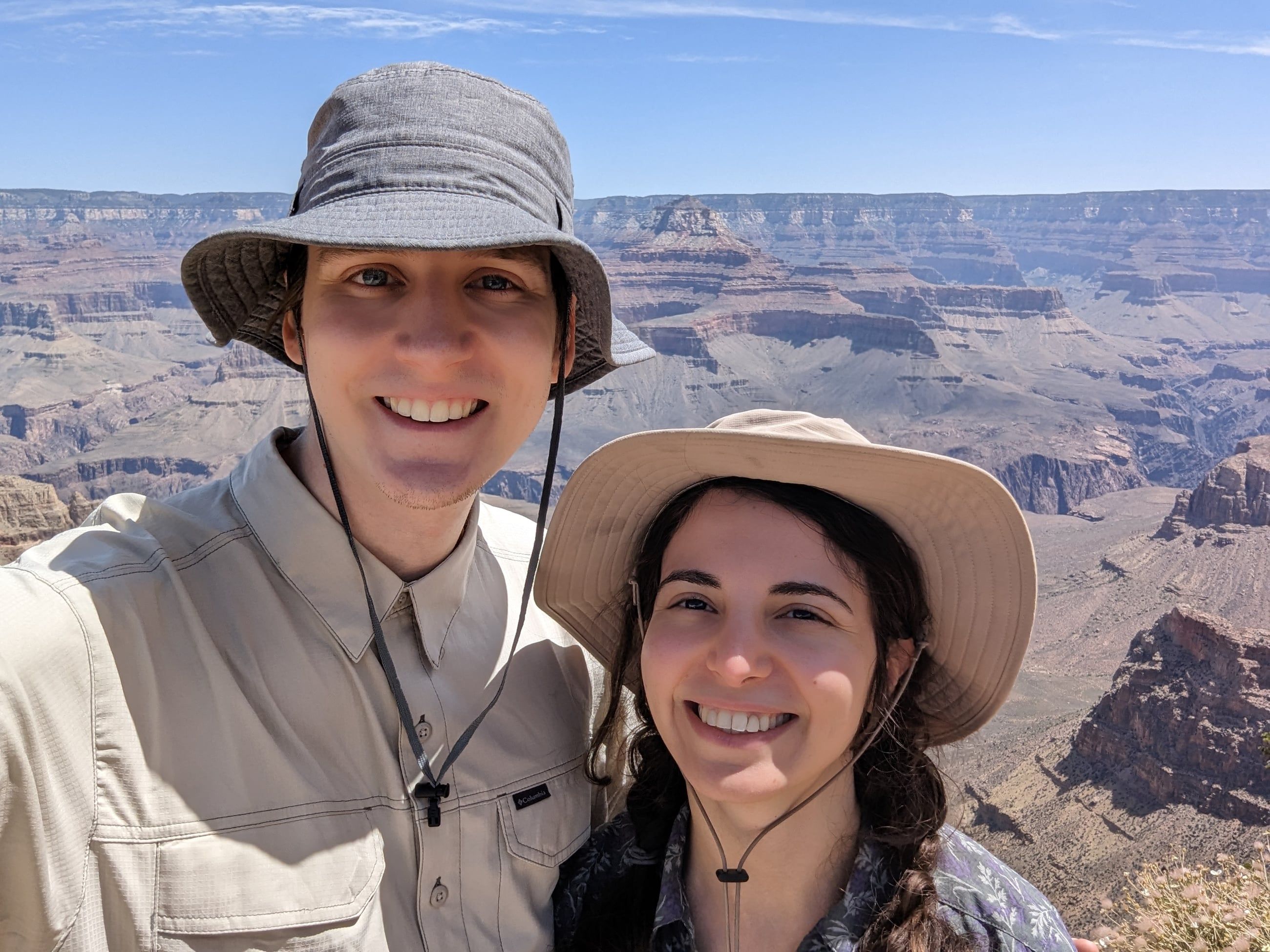 Katherine and Johnny in sun hats on the rim of the Grand Canyon